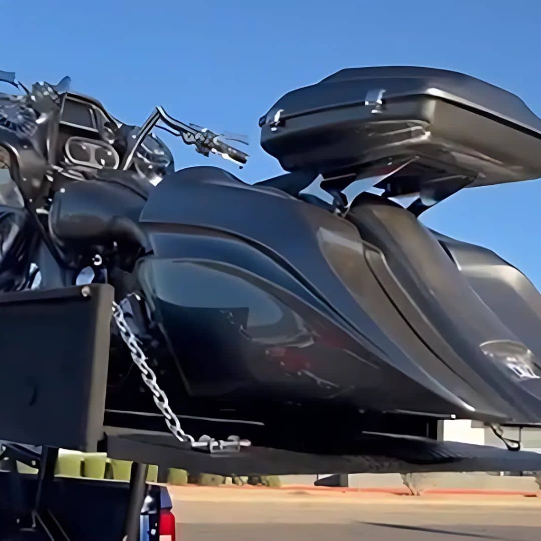 A motorcycle loaded onto our stable, professional motorcycle towing system